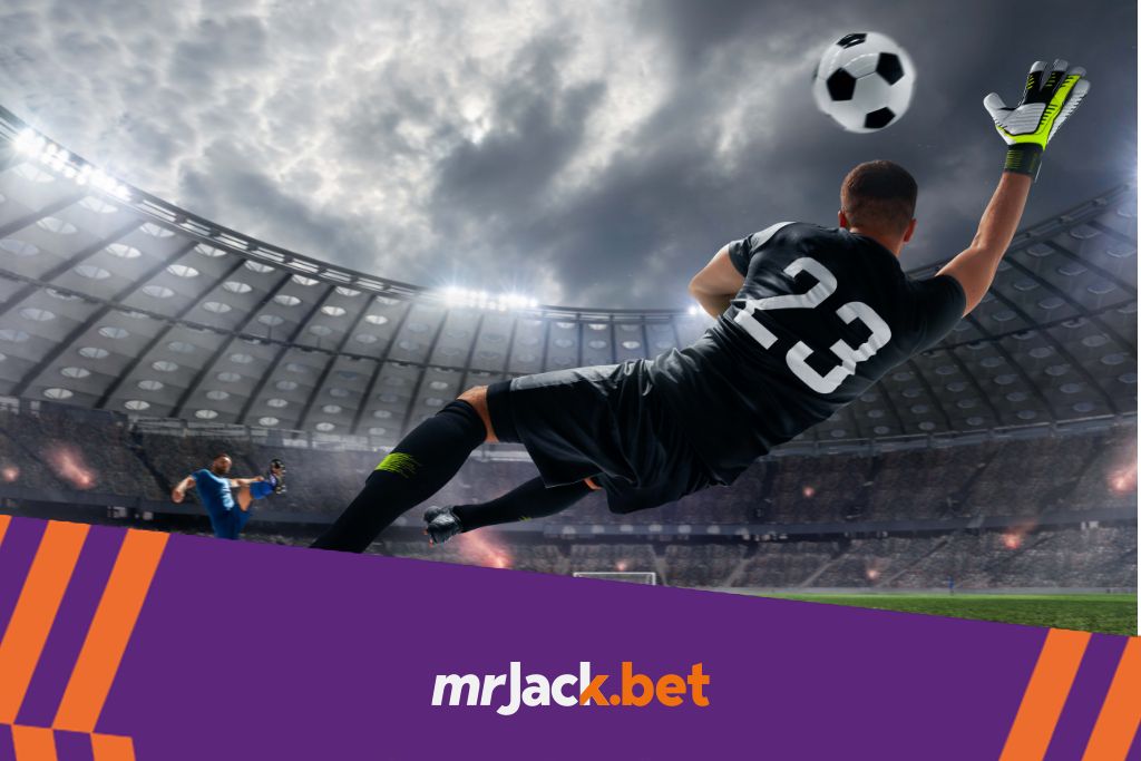 Empate anula aposta (Draw no Bet): conheça essa modalidade de aposta esportiva 5 Goleiro de futebol saltando em direção a bola para fazer uma defesa